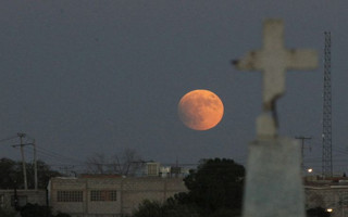 A supermoon, the last of this year's supermoons, is pictured in the sky in Ciudad Juarez