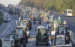 French farmers from western France regions drive their tractors on the A10 motorway outside Paris