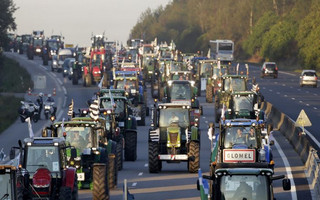 French farmers from western France regions drive their tractors on the A10 motorway outside Paris