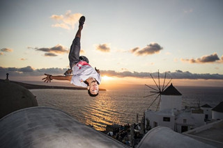 Dimitris Kyrsanidis of Greece performs in Oia on island of Santorini, Greece on September 30, 2015