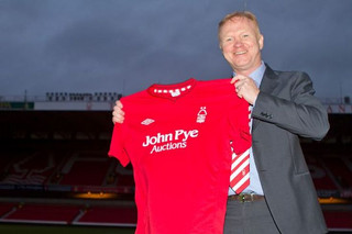 alex_mcleish_flashes_a_smile_after_taking_over_at_the_city_ground