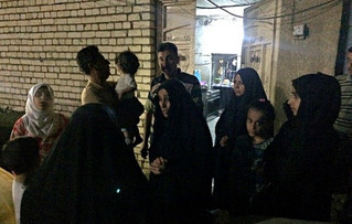 People stand in the street after feeling aftershocks from an earthquake in Baghdad, Iraq, Sunday, Nov. 12, 2017. The deadly earthquake hit the region along the border between Iran and Iraq on Sunday. The U.S. Geological Survey said the quake was centered 19 miles (31 kilometers) outside the eastern Iraqi city of Halabja. (AP Photo/Hadi Mizban)