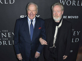 Christopher Plummer, left, and director Ridley Scott arrive at the world premiere of "All the Money in the World" at the Samuel Goldwyn Theater on Monday, Dec. 18, 2017, in Beverly Hills, Calif. (Photo by Jordan Strauss/Invision/AP)