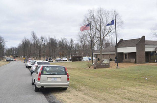 Authorities investigate the scene of school shooting, Tuesday, Jan 23, 2018, in Benton, Ky. Kentucky State Police said the suspect was apprehended by a Marshall County deputy. (AP Photo/Stephen Lance Dennee)