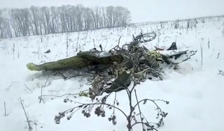 In this screen grab provided by the Life.ru, the wreckage of a AN-148 plane is seen in Stepanovskoye village, about 40 kilometers (25 miles) from the Domodedovo airport, Russia, Sunday, Feb. 11, 2018. Russia's Emergencies Ministry says a passenger plane has crashed near Moscow and fragments of it have been found. (Life.ru via AP)