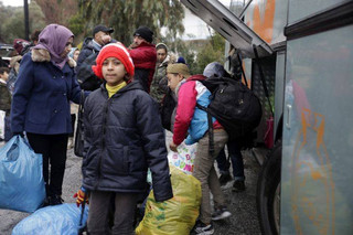 Refugees and migrants arrive at a hotel in Thermi village after they moved from Moria refugee camp on the eastern Greek island of Lesbos, Tuesday, Jan. 10, 2017. Greek authorities moved some 250 people to hotels, following strong criticism from aid agencies and medical associations that refugees had been left unprotected during the last heavy snowfall. (AP Photo/Nikolia Apostolou)