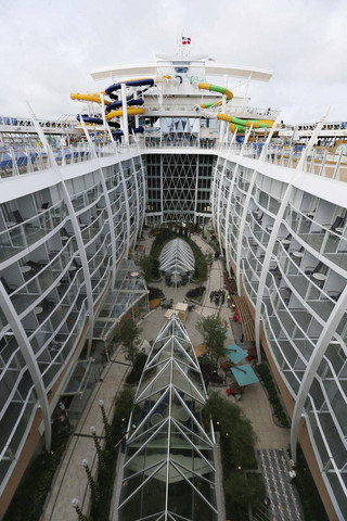 General view of The Symphony of the Seas docking at Saint Nazaire port, western France, Friday, March 23, 2018. Royal Caribbean International took delivery of the much-awaited, 228,081-ton Symphony of the Seas from the French shipyard STX. (AP Photo/David Vincent)