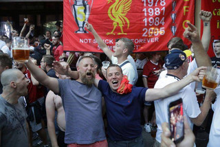 Liverpool supporters gather in Kiev, Ukraine, Friday, May 25, 2018. Supporters were gathering in Kiev ahead of the Champions League final soccer match between Real Madrid and Liverpool on Saturday May 26. (AP Photo/Efrem Lukatsky)