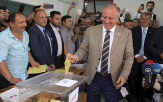 Muharrem Ince, the presidential candidate of Turkey's main opposition Republican People's Party, or CHP, casts his ballot for Turkey's elections at a polling station in Yalova, northwestern Turkey, Sunday, June 24, 2018. Turkish voters are voting Sunday in a historic double election for the presidency and parliament. (AP Photo)