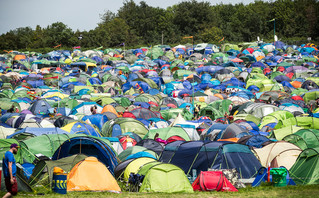 Spectators and scenes at the Glastonbury Festival