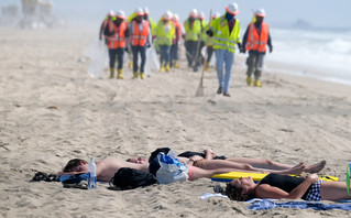 Citizens sunbathe