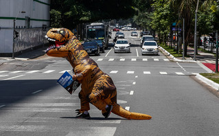 A dinosaur on the road