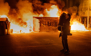 Protesters are kissing