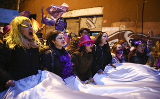Protesters shout slogans as they march to mark International Women's Day in Istanbul, Turkey, Tuesday, March 8, 2022 Protesters shout slogans as they march to mark International Women's Day in Istanbul, Turkey, Tuesday, March 8, 2022