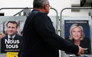 posters of French President and centrist candidate for reelection Emmanuel Macron and French far-right presidential candidate Marine Le Pen in Anglet, southwestern France
