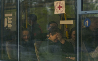 From left, Serhii Tsybulchenko, Ihor Trotsak, Tetyana Trotsak and Elina Tsybulchenko, who fled from the Azovstal steel plant in Mariupol, Ukraine, arrive by bus to a reception center for displaced people in Zaporizhzhia, Ukraine, Tuesday, May 3, 2022 From left, Serhii Tsybulchenko, Ihor Trotsak, Tetyana Trotsak and Elina Tsybulchenko, who fled from the Azovstal steel plant in Mariupol, Ukraine, arrive by bus to a reception center for displaced people in Zaporizhzhia, Ukraine, Tuesday, May 3, 2022