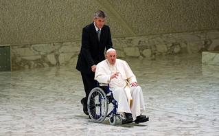 In a wheelchair, Pope Francis