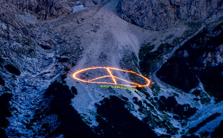 the peace sign with candles