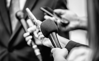 Black and white photo with microphones