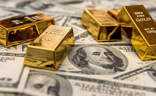 Ράβδοι χρυσού και δολάρια