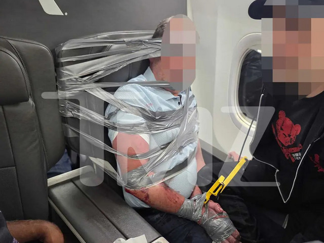 American Airlines Passenger Restrained With Duct Tape